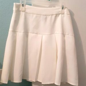 White pleated skirt